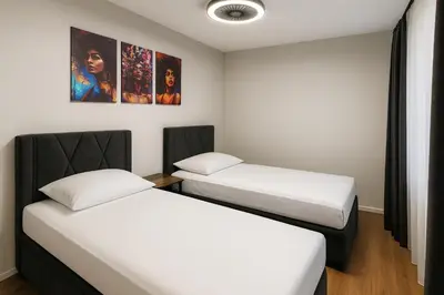 Ein Bett oder Betten in einem Zimmer der Unterkunft la Plaza24