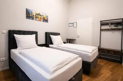 Ein Bett oder Betten in einem Zimmer der Unterkunft la Plaza24
