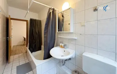 Ein Badezimmer in der Unterkunft BEGE APARTMENTS CityApartment