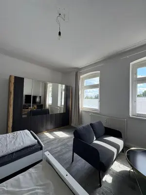 Ein Bett oder Betten in einem Zimmer der Unterkunft Seibel's SUITES - Big in Essen - Family & Group