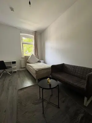 Ein Sitzbereich in der Unterkunft Seibel's SUITES - Big in Essen - Family & Group