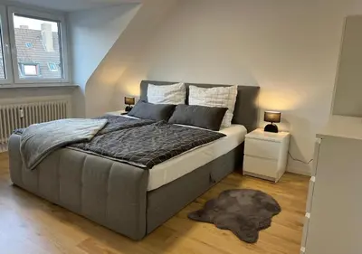 Ein Bett oder Betten in einem Zimmer der Unterkunft CityLoft Wlan Zentral