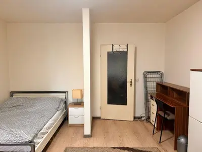 Ein Bett oder Betten in einem Zimmer der Unterkunft 1 Zimmer Wohnung mit Küche und Bad in Dortmund Brackel