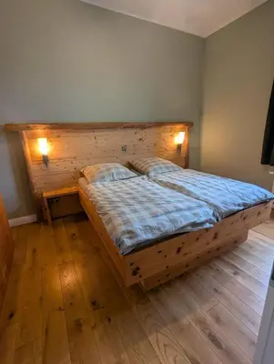 Ein Bett oder Betten in einem Zimmer der Unterkunft Gästehaus LeLo 6
