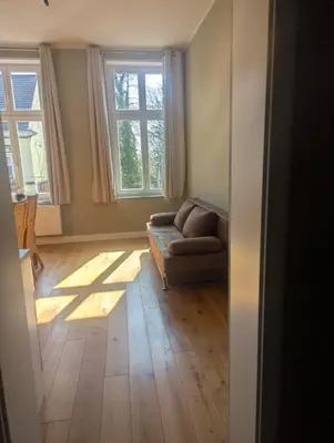 Ein Sitzbereich in der Unterkunft Gästehaus LeLo 6