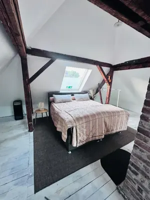 Ein Bett oder Betten in einem Zimmer der Unterkunft S-Art Living