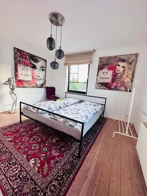 Ein Bett oder Betten in einem Zimmer der Unterkunft S-Art Living