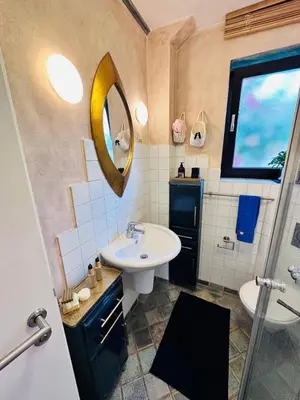 Ein Badezimmer in der Unterkunft S-Art Living