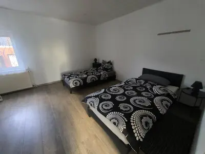 Ein Bett oder Betten in einem Zimmer der Unterkunft Mego Unterkünfte 1
