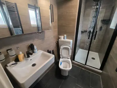 Ein Badezimmer in der Unterkunft Mego Unterkünfte 1