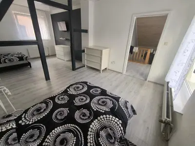 Ein Bett oder Betten in einem Zimmer der Unterkunft Mego Unterkünfte 1