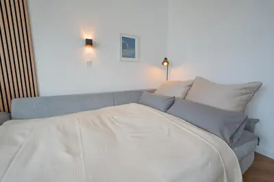 Ein Bett oder Betten in einem Zimmer der Unterkunft TANIC Central Loft Main Station