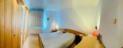 Ein Bett oder Betten in einem Zimmer der Unterkunft Großzügige Wohnung mit großem Wohnzimmer im Zentrum von Hagen