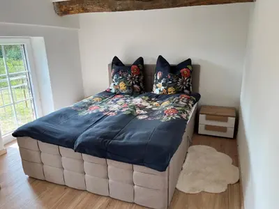 Ein Bett oder Betten in einem Zimmer der Unterkunft NEU! Moderne FeWo in Bönen