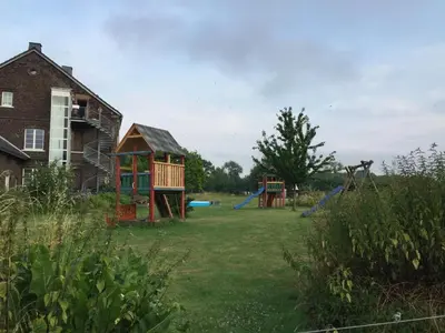 Ein Kinderspielbereich in der Unterkunft NEU! Moderne FeWo in Bönen