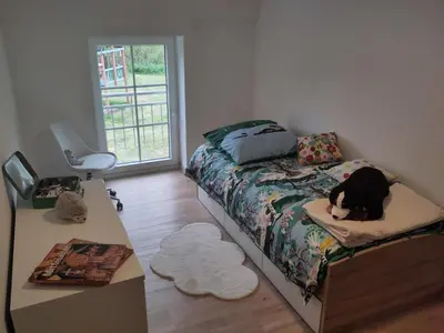 Ein Bett oder Betten in einem Zimmer der Unterkunft NEU! Moderne FeWo in Bönen