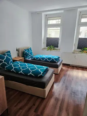 Ein Bett oder Betten in einem Zimmer der Unterkunft Schöne gemütliche Wohnung im Wasserviertel Stadtnah, A40,nähe der Uni oder Zoo