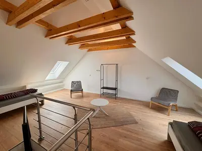 Ein Sitzbereich in der Unterkunft Rheinberg Alstadt Maisonettenwohnung
