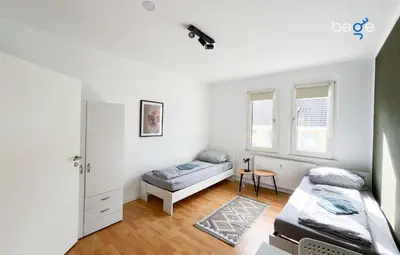 Ein Bett oder Betten in einem Zimmer der Unterkunft BEGE APARTMENTS EasyStay