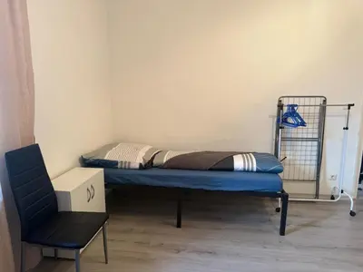 Ein Bett oder Betten in einem Zimmer der Unterkunft K&K Unterkunft Gelsenkirchen