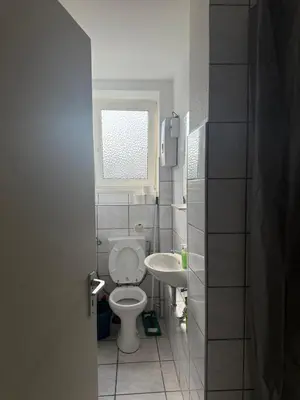 Ein Badezimmer in der Unterkunft K&K Unterkunft Gelsenkirchen