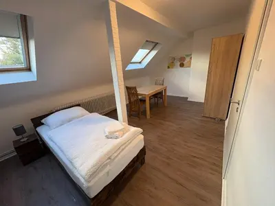 Ein Bett oder Betten in einem Zimmer der Unterkunft Ferienwohnung Victoria
