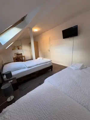 Ein Bett oder Betten in einem Zimmer der Unterkunft Ferienwohnung Victoria