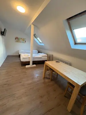 Ein Bett oder Betten in einem Zimmer der Unterkunft Ferienwohnung Victoria