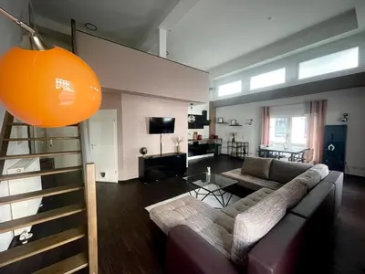 Ein Sitzbereich in der Unterkunft Charmantes Loft-Apartment 2 Min zum Hauptbahnhof