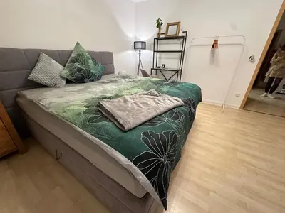Ein Bett oder Betten in einem Zimmer der Unterkunft Seibel's SUITES - Ruhrpott Oase Altenessen-Mitte