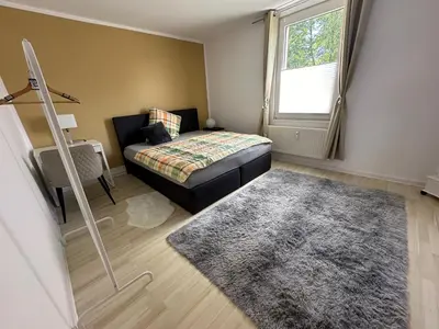 Ein Bett oder Betten in einem Zimmer der Unterkunft Seibel's SUITES - Ruhrpott Oase Altenessen-Mitte
