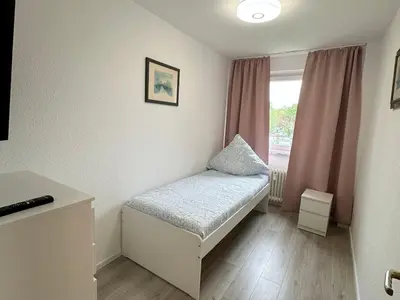 Ein Bett oder Betten in einem Zimmer der Unterkunft Beautiful apartments in Bergkamen bei Dortmund