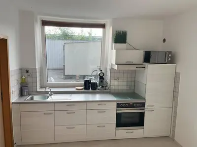 Küche/Küchenzeile in der Unterkunft Gemütliche Wohnung, ruhige Lage
