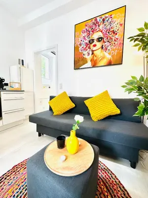 Ein Sitzbereich in der Unterkunft Mola Apartments- Trendiges Apartment in der City-Nähe Dortmund-Terrasse-3 Gäste-WLAN