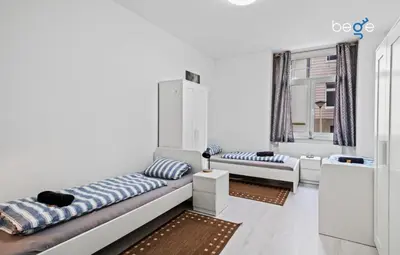 Ein Bett oder Betten in einem Zimmer der Unterkunft BEGE APARTMENTS MyWork Apartment