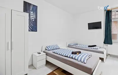Ein Bett oder Betten in einem Zimmer der Unterkunft BEGE APARTMENTS MyWork Apartment