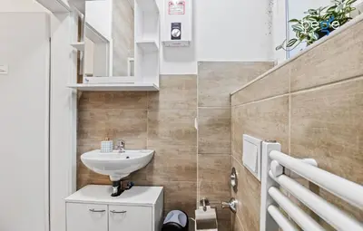 Ein Badezimmer in der Unterkunft BEGE APARTMENTS MyWork Apartment