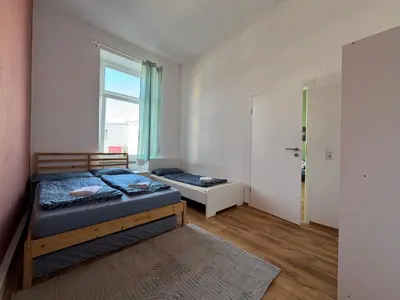 Ein Bett oder Betten in einem Zimmer der Unterkunft 4YOU Appartement Ferien & Monteursunterkunft