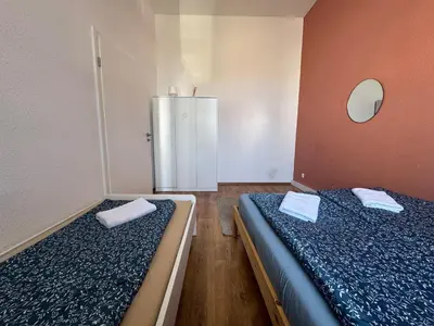 Ein Bett oder Betten in einem Zimmer der Unterkunft 4YOU Appartement Ferien & Monteursunterkunft
