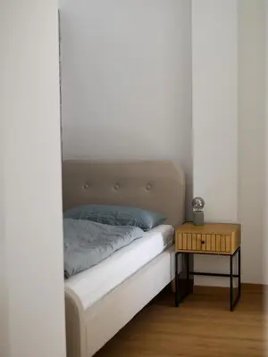 Ein Bett oder Betten in einem Zimmer der Unterkunft Burg Domizil