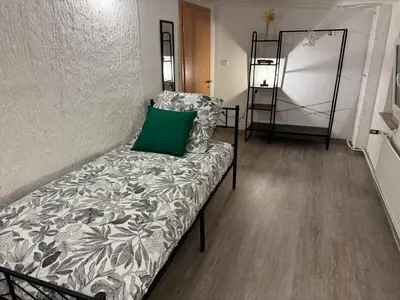 Ein Bett oder Betten in einem Zimmer der Unterkunft Kleines Wiesel