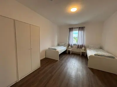 Ein Bett oder Betten in einem Zimmer der Unterkunft WDI - WorkersChoice