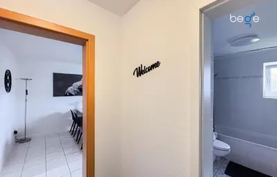 Ein Badezimmer in der Unterkunft BEGE APARTMENTS Your Cozy Flat