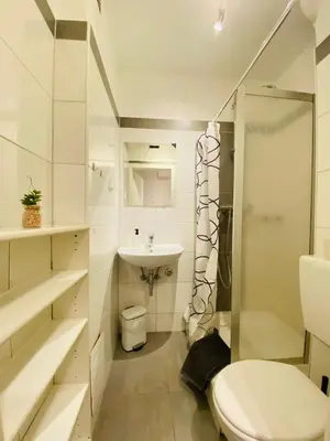 Ein Badezimmer in der Unterkunft SASI HOMES - WorkBase