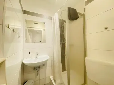 Ein Badezimmer in der Unterkunft SASI HOMES - WorkBase