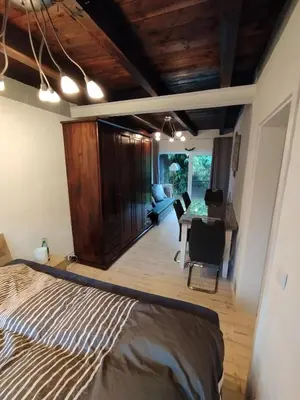 Ein Bett oder Betten in einem Zimmer der Unterkunft Blaues Haus - kleinere Doppelhaushälfte in Stadtkernnähe mit traumhaftem Bad und Küche
