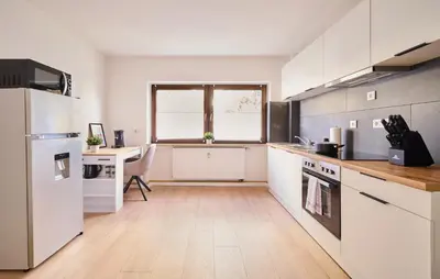 Küche/Küchenzeile in der Unterkunft Goodliving Apartment City Residenz