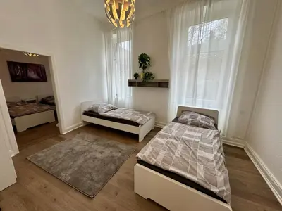 Ein Bett oder Betten in einem Zimmer der Unterkunft Modern apartment in Solingen with perfect connections