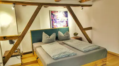 Ein Bett oder Betten in einem Zimmer der Unterkunft bei GRETA Wohnung 77