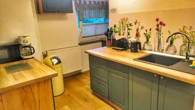Küche/Küchenzeile in der Unterkunft bei GRETA Wohnung 77